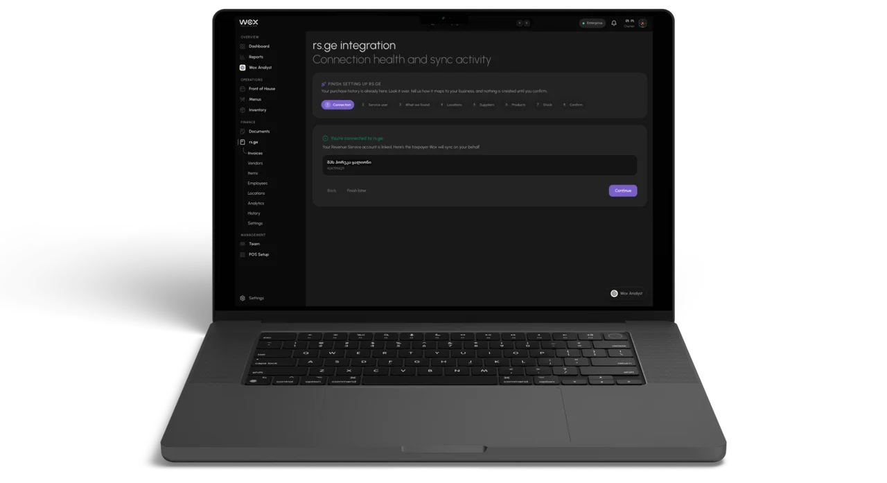 The Wox web dashboard on a laptop, showing the rs.ge integration setup with the Revenue Service account connected